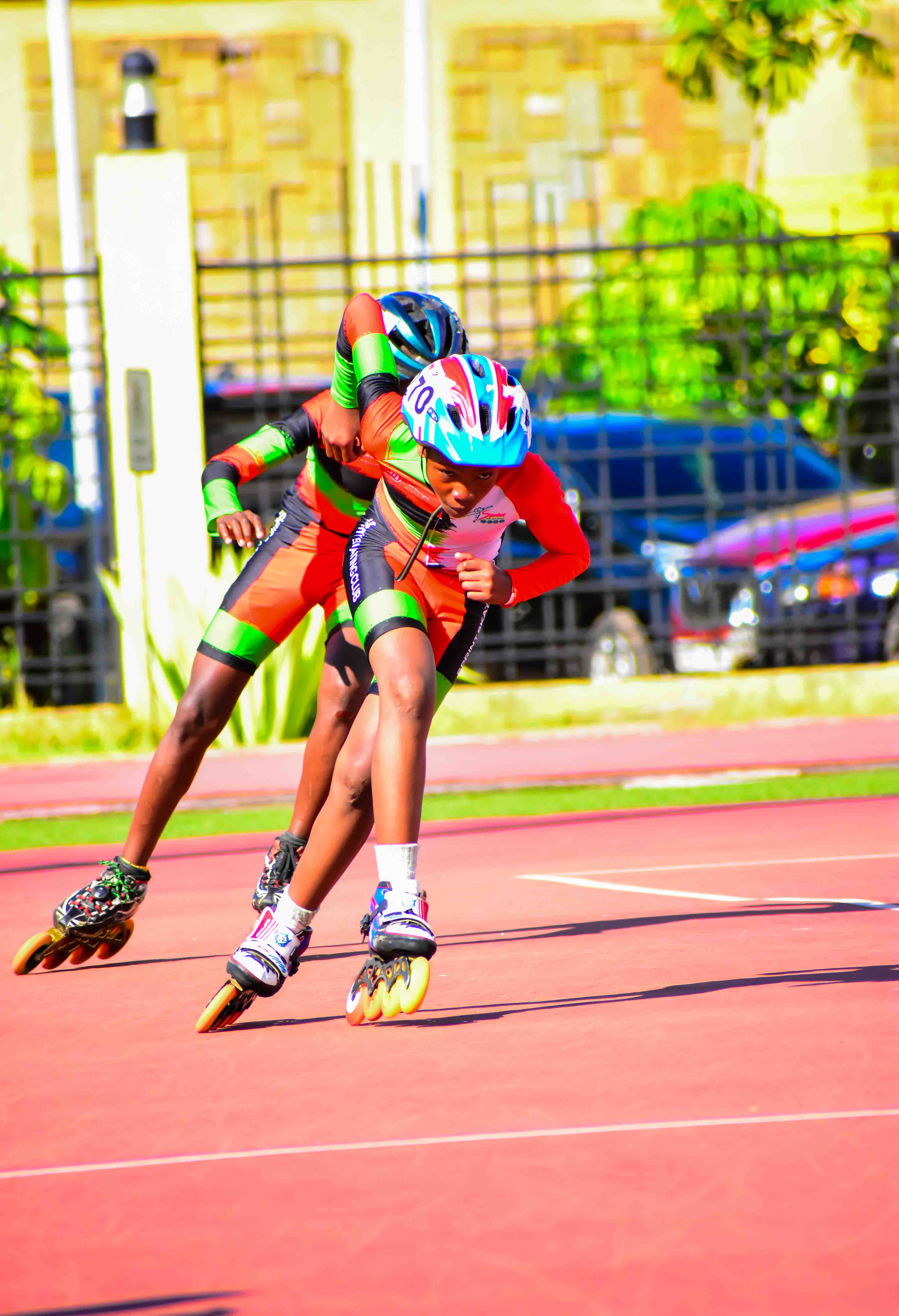 Swimmer diving into pool at competition